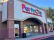 Party City commercial building at retail shopping center showing entrance with closing signs on display at 1700 Fulmont Circle, Mableton, GA 30126