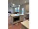 View of kitchen island from living area, showcasing the open floor plan at 1700 Fulmont Circle, Mableton, GA 30126