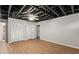 Finished basement featuring exposed ceiling, ceiling fan, and double closets at 1012 Crown River Pkwy, Mcdonough, GA 30252