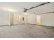 Large garage space with ample room for storage and access to the interior at 1012 Crown River Pkwy, Mcdonough, GA 30252