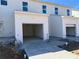 New construction home featuring garages with concrete driveways at 1582 Driggs Nw Dr # 169, Atlanta, GA 30318