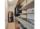 Walk-in closet boasts shelving for optimal storage and organization at 4178 Butler Dr # 98, Atlanta, GA 30341