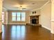 Spacious Gathering room with corner fireplace and hardwood floors at 416 Aristides Way, Canton, GA 30115