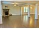 Open floor plan Gathering room with hardwood floors and fireplace at 416 Aristides Way, Canton, GA 30115