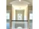 Open second floor hallway with chandelier and views to the first floor at 416 Aristides Way, Canton, GA 30115