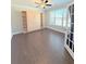 Spacious home office with hardwood floors and built-in wall unit at 416 Aristides Way, Canton, GA 30115