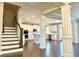 Open concept kitchen with island, stainless steel appliances, and hardwood floors at 416 Aristides Way, Canton, GA 30115