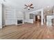 Open living space with hardwood floors and fireplace at 5104 Waters Edge Trl, Roswell, GA 30075