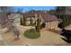 Large brick house situated on a spacious lot with landscaping at 511 Baxter Way, Marietta, GA 30064