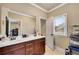 Bathroom featuring a double vanity and a window, offering both functionality and natural light at 511 Baxter Way, Marietta, GA 30064