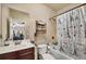 Cozy bathroom with a shower-tub combo and Eiffel Tower-themed shower curtain at 511 Baxter Way, Marietta, GA 30064