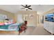 Spacious bedroom featuring plush carpet, a ceiling fan, and a comforting ambiance at 511 Baxter Way, Marietta, GA 30064