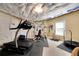 Fully equipped exercise room with a treadmill, weight rack, and trampoline, perfect for home workouts at 511 Baxter Way, Marietta, GA 30064