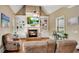 Comfortable living room with vaulted ceiling, fireplace, built-in shelving, and a large TV at 511 Baxter Way, Marietta, GA 30064