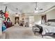 Large main bedroom with plush carpeting, fireplace, tray ceiling, and lots of natural light at 511 Baxter Way, Marietta, GA 30064