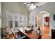 Lovely office area with a large window, hardwood floors, and a light fixture on the ceiling at 511 Baxter Way, Marietta, GA 30064