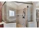 Bathroom shower features a glass door and tile surround at 511 Baxter Way, Marietta, GA 30064