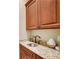 Close up of vanity with granite counters and wood cabinetry at 511 Baxter Way, Marietta, GA 30064