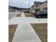Quiet street with houses and sidewalks at 2398 Ticonic Rd, Lithonia, GA 30058