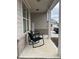 Front porch with rocking chairs and a home sweet home sign at 2398 Ticonic Rd, Lithonia, GA 30058