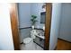 Small bathroom with updated sink and toilet at 744 Law Nw St, Atlanta, GA 30318