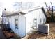 Side view of light blue house with AC unit at 744 Law Nw St, Atlanta, GA 30318