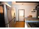 Kitchen with stainless steel refrigerator and backyard access at 744 Law Nw St, Atlanta, GA 30318