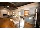 Open concept kitchen and living area with hardwood floors and island at 744 Law Nw St, Atlanta, GA 30318