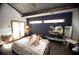 Main bedroom with a king-size bed and access to the backyard at 744 Law Nw St, Atlanta, GA 30318