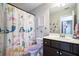 Charming bathroom with mermaid-themed decor at 5008 Bayborough Dr, Hoschton, GA 30548