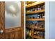 Well-organized pantry with ample shelving for storage at 5008 Bayborough Dr, Hoschton, GA 30548