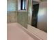 Classic bathroom countertop with decorative wallpaper, providing a glimpse into the adjacent space at 7 Quail Run, Decatur, GA 30035