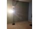 Bedroom with neutral walls and wall to wall carpeting and a standing lamp at 7 Quail Run, Decatur, GA 30035