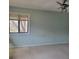Bedroom with a single window and neutral walls, ready for new decor and design at 7 Quail Run, Decatur, GA 30035
