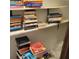 Shelves filled with various books and items at 7 Quail Run, Decatur, GA 30035