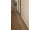 Long hallway with carpeted floors and doors leading to other rooms at 7 Quail Run, Decatur, GA 30035