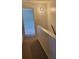Hallway featuring neutral carpet with view into adjacent rooms at 7 Quail Run, Decatur, GA 30035
