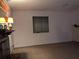 Neutral living room featuring wall to wall carpeting and a fireplace underneath a mirror at 7 Quail Run, Decatur, GA 30035
