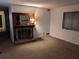 Cozy living room with a fireplace and a mirror mantel creating a warm and inviting atmosphere at 7 Quail Run, Decatur, GA 30035
