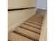 Carpeted staircase leading to upper level at 7 Quail Run, Decatur, GA 30035