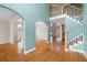 Bright two story entryway with hardwood floors and staircase at 879 Ector Chase Nw, Kennesaw, GA 30152