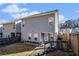 A two story home features gray siding and fenced yard at 202 Bryon Ln, Acworth, GA 30102