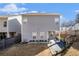 The house features gray siding and a small patio at 202 Bryon Ln, Acworth, GA 30102