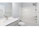 A bright bathroom with a white vanity, toilet, and shower-tub combo at 202 Bryon Ln, Acworth, GA 30102