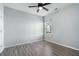 Unfurnished bedroom with sleek flooring, neutral walls, and large window with natural light at 202 Bryon Ln, Acworth, GA 30102