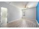 Large bedroom featuring a ceiling fan, wood floors, and plenty of natural light at 202 Bryon Ln, Acworth, GA 30102