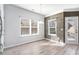 The dining area features natural light and a stylish wood accent wall at 202 Bryon Ln, Acworth, GA 30102
