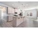 Modern kitchen with stainless steel appliances, granite countertops, and a spacious island at 202 Bryon Ln, Acworth, GA 30102
