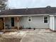 Home's backyard with a patio and wooden fence at 2615 Leeshire Ct # 1, Tucker, GA 30084