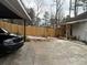 Home's backyard with a patio and wooden fence at 2615 Leeshire Ct # 1, Tucker, GA 30084